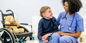 A child with special needs due to chromosome 8P inversion duplication syndrome with a doctor.